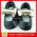 Alibaba china new style black and gold bow cow leather moccasins baby girl shoes